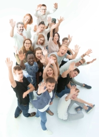 top view. group of happy young people looking at the camera
